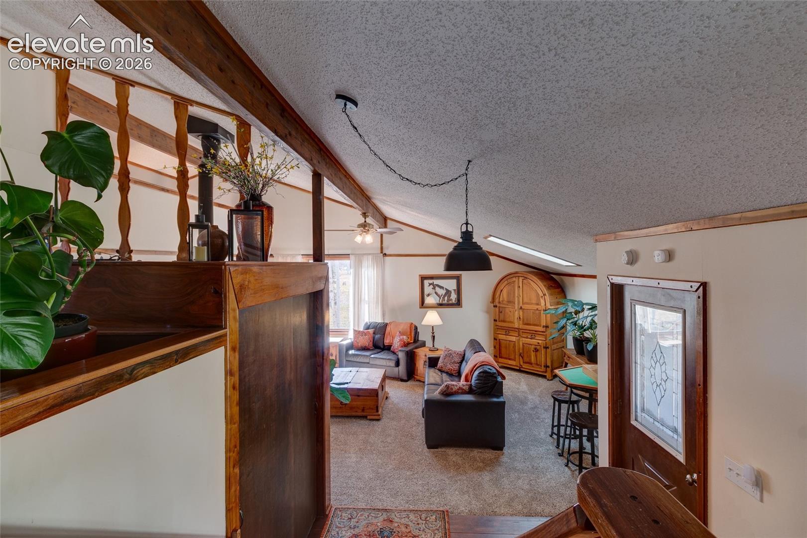 Entry with coat closet + wide plank floors