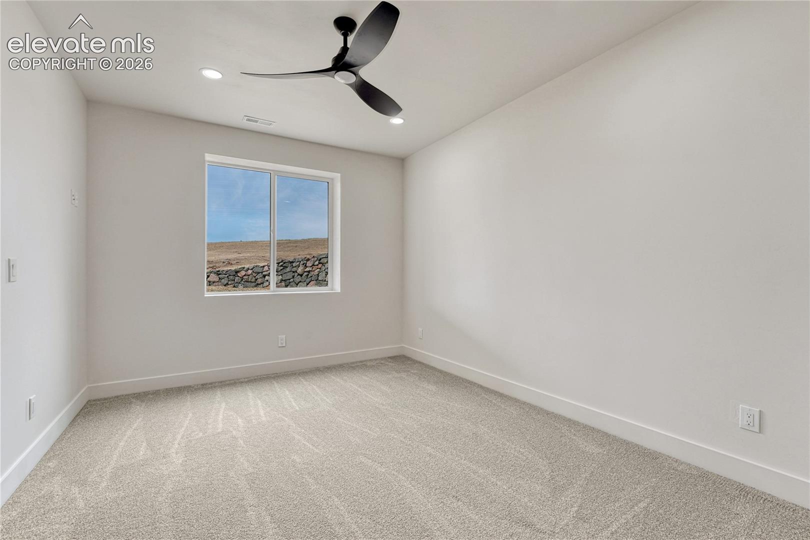 First of two lower level bedrooms. 