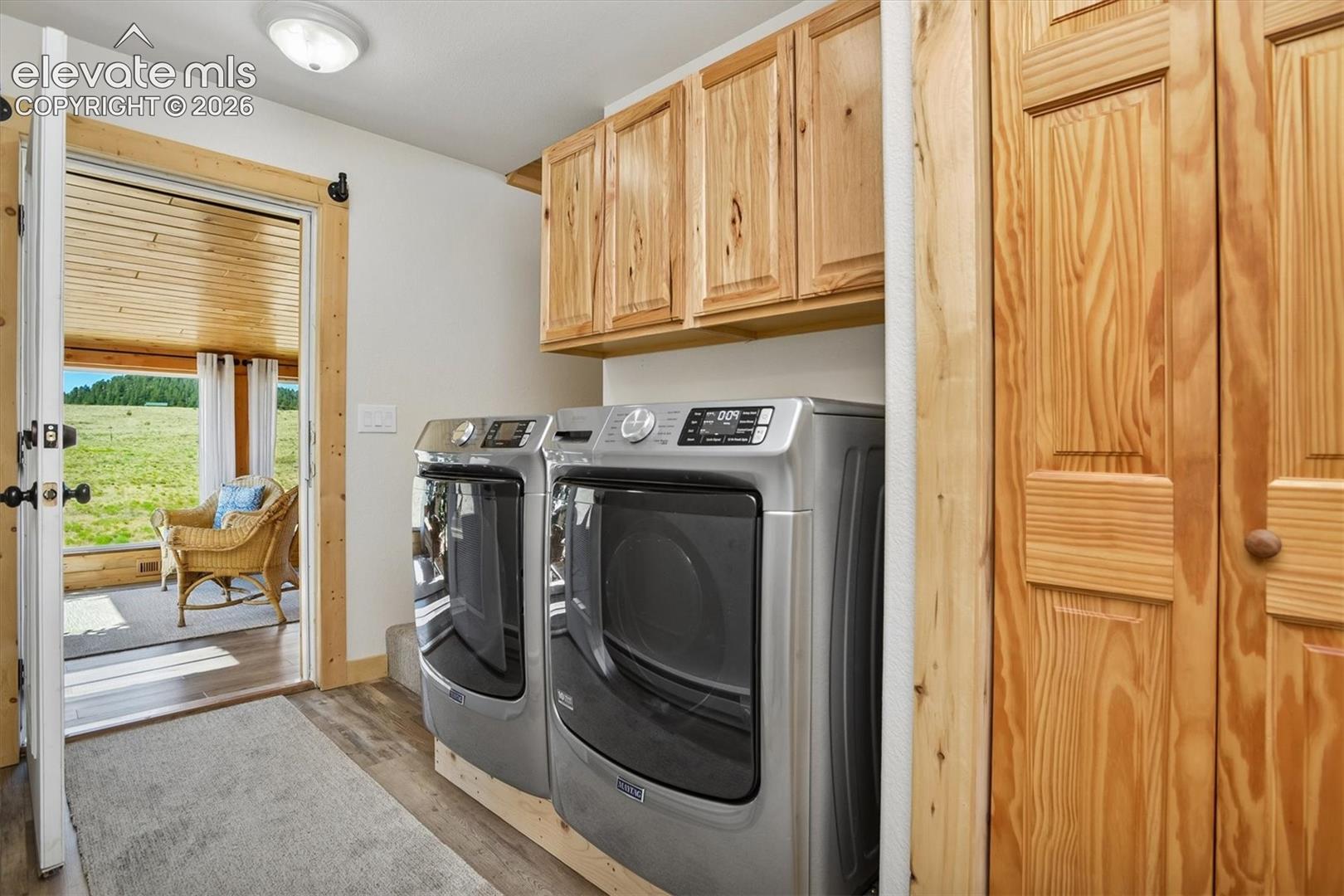 Dedicated laundry area featuring modern appliances