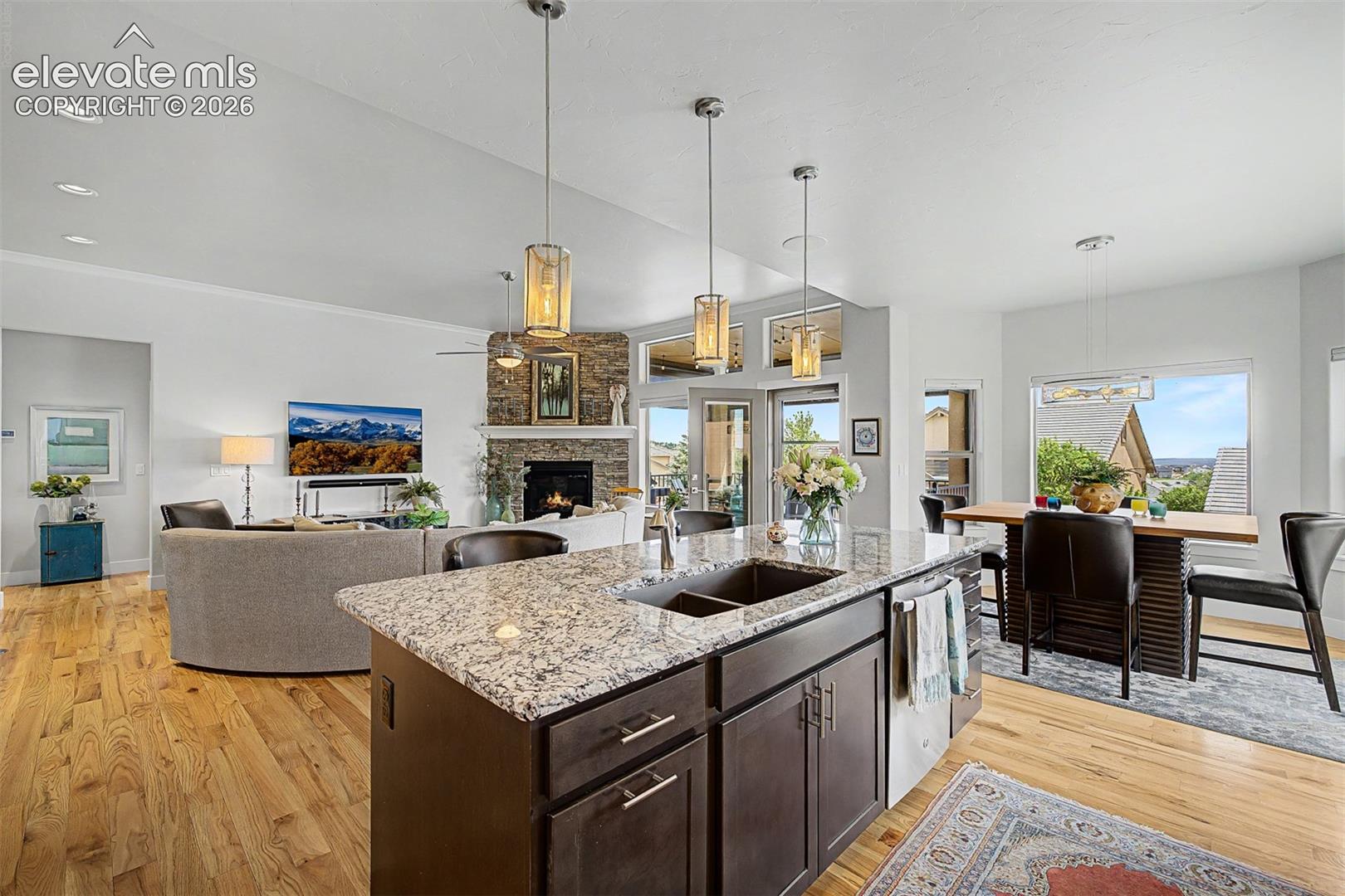 Large open space, with beautiful hardwood floors and a floor to ceiling fireplace!