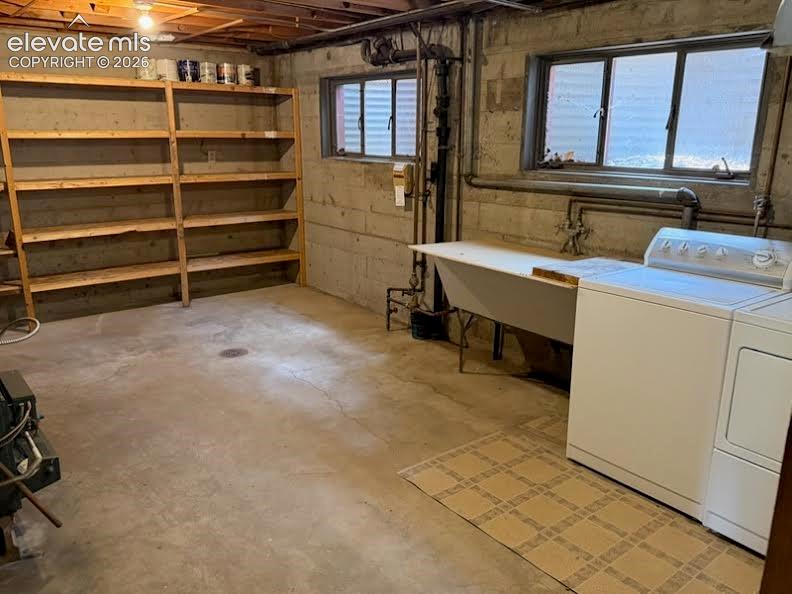 Huge laundry room with sink and lots of storage