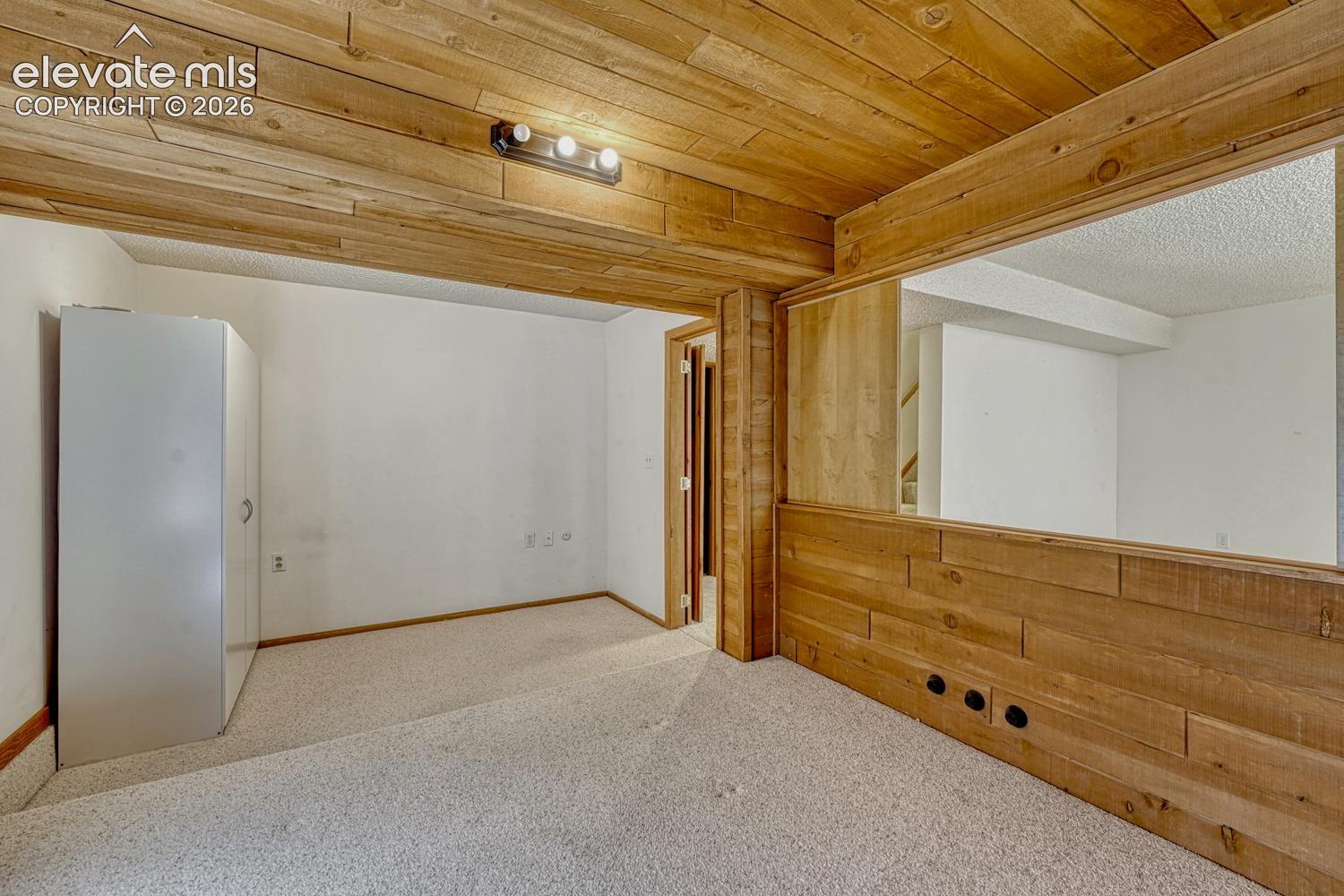 Basement bedroom #3 is a versatile room that expands your living space that can be utilized in a variety of ways to include a bedroom, home office, gym, or play room.