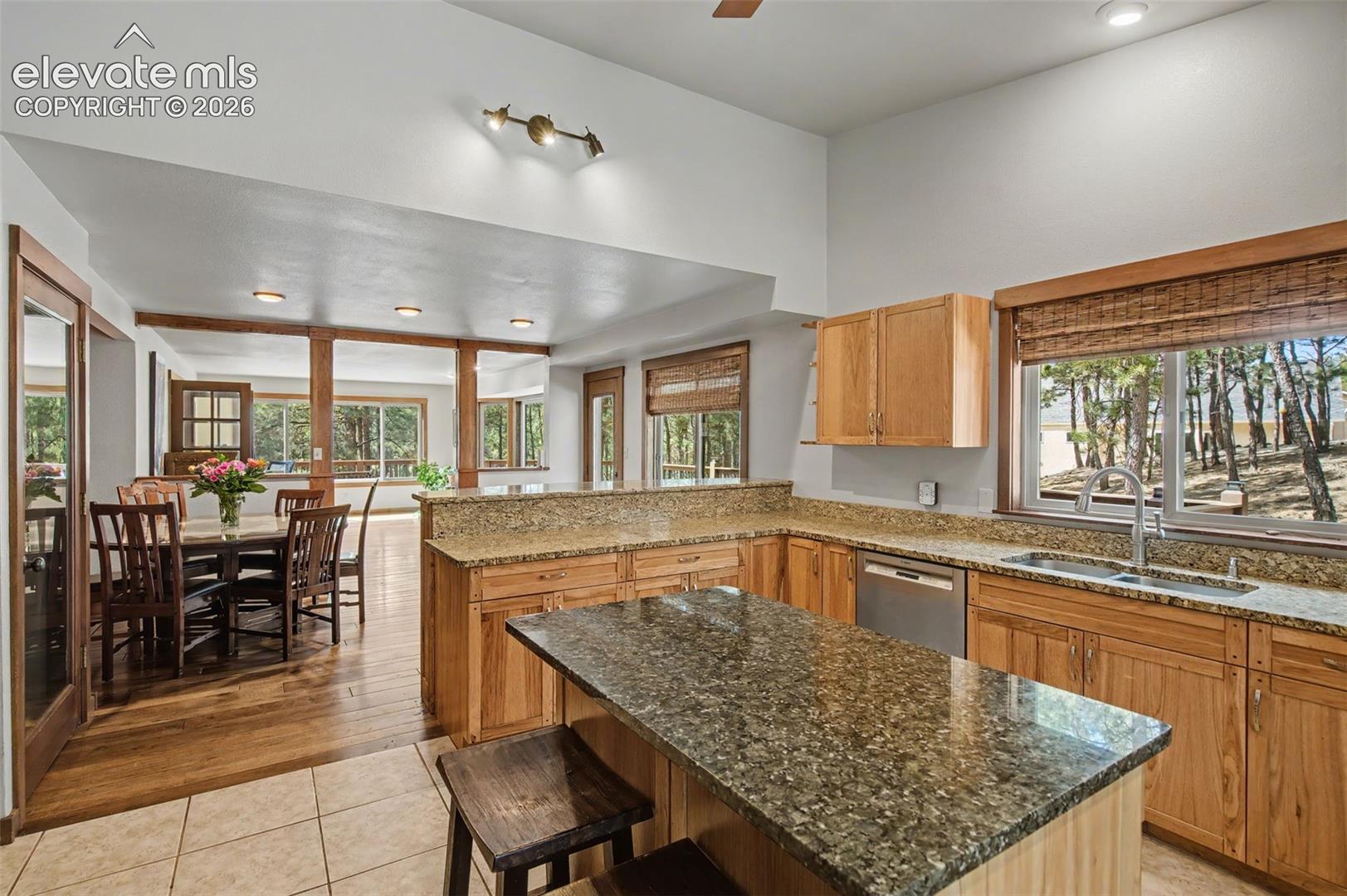 Kitchen island, including a breakfast bar area.