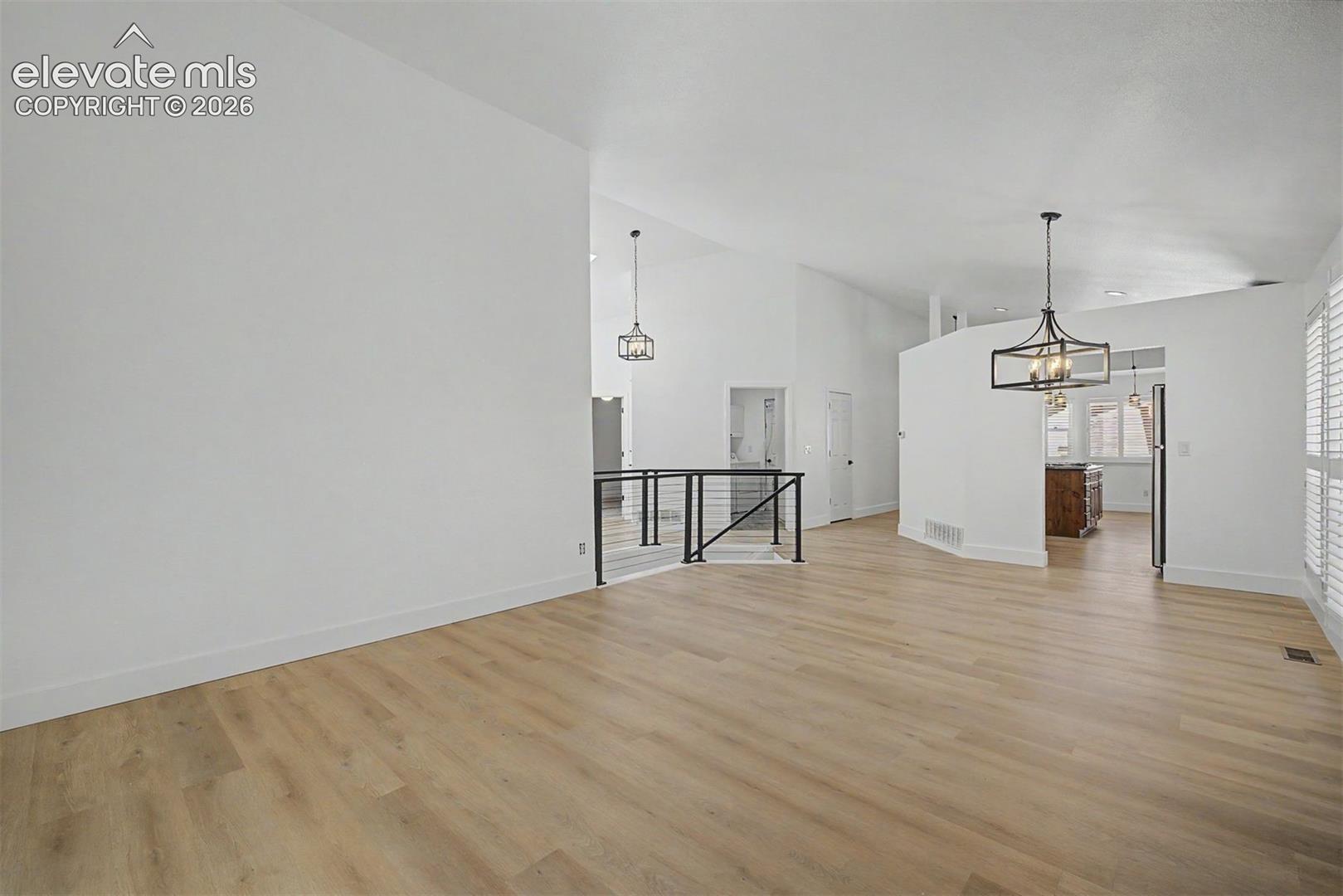 Living room with fireplace and attached sunroom