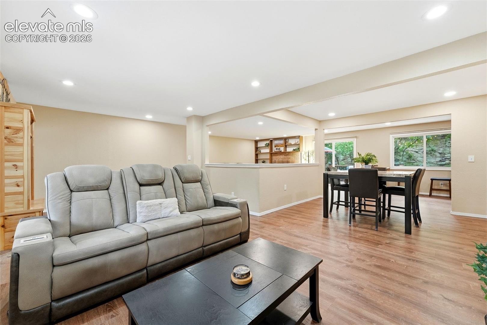 Living room/ Dining room combo open to the dining area.