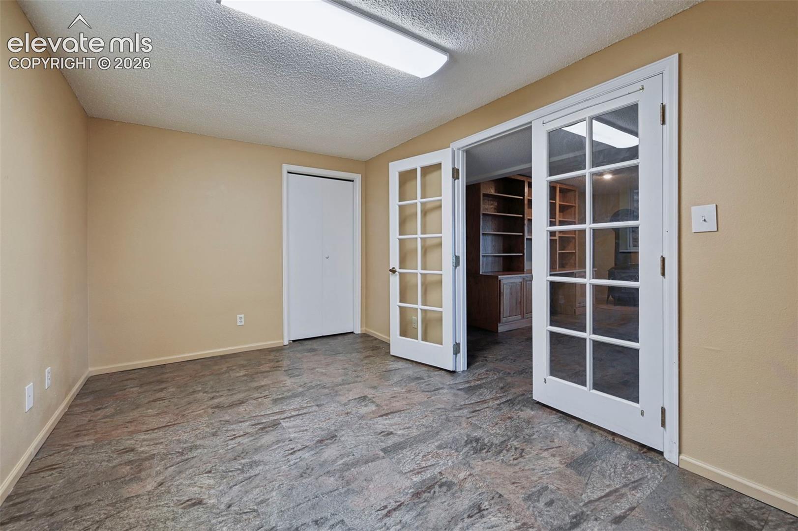 Office/additional bedroom with closet. Downstairs