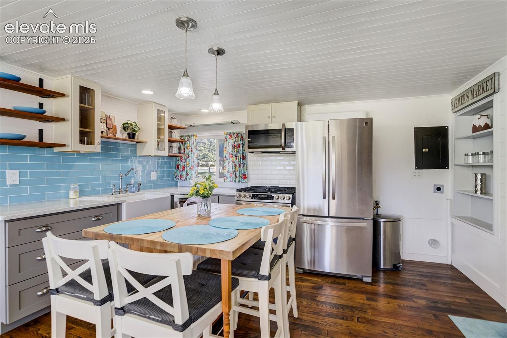 The space next to the refrigerator is for the stackable washer & dryer