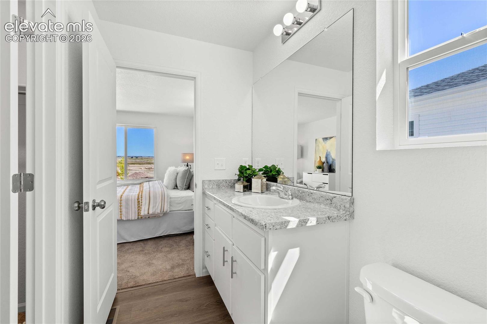 White vanity with an integrated sink and light-colored countertop
*photos  of a model home*