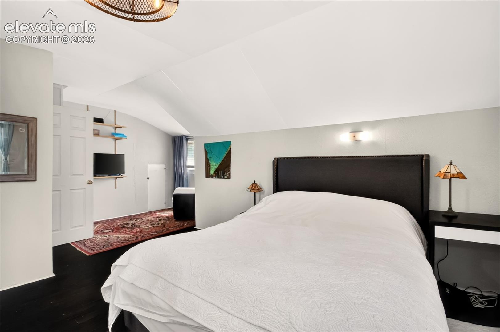 Primary bedroom and sitting room