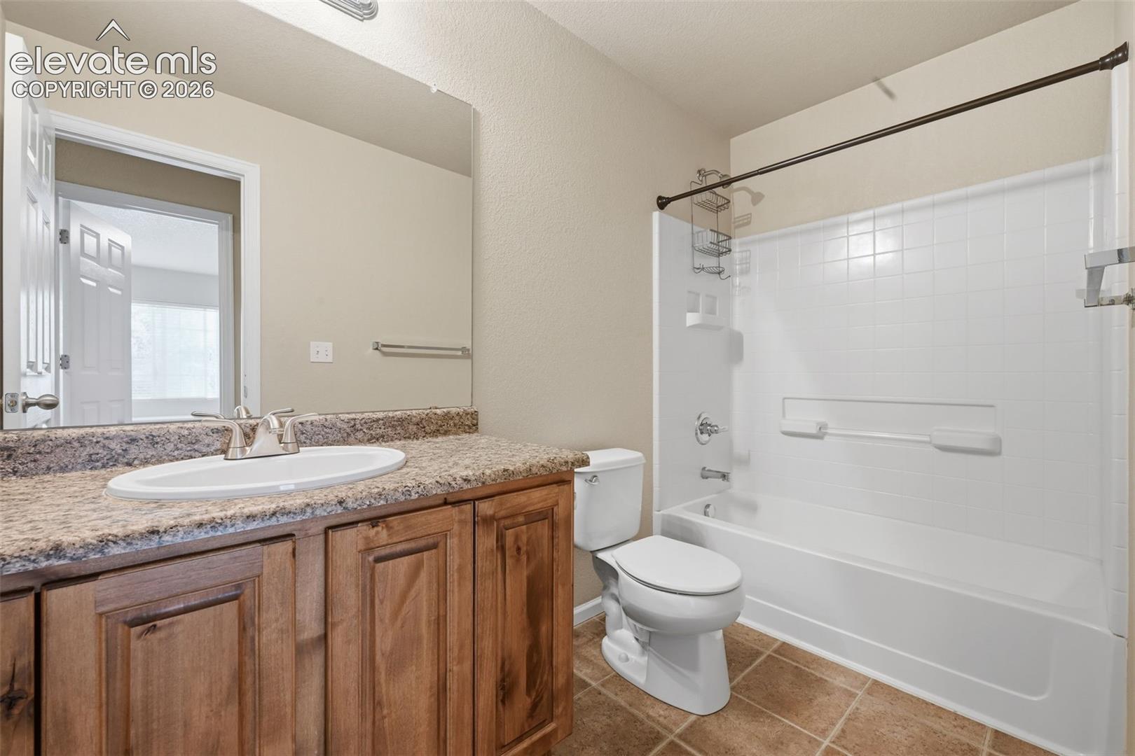 Upper level full hallway bathroom. 