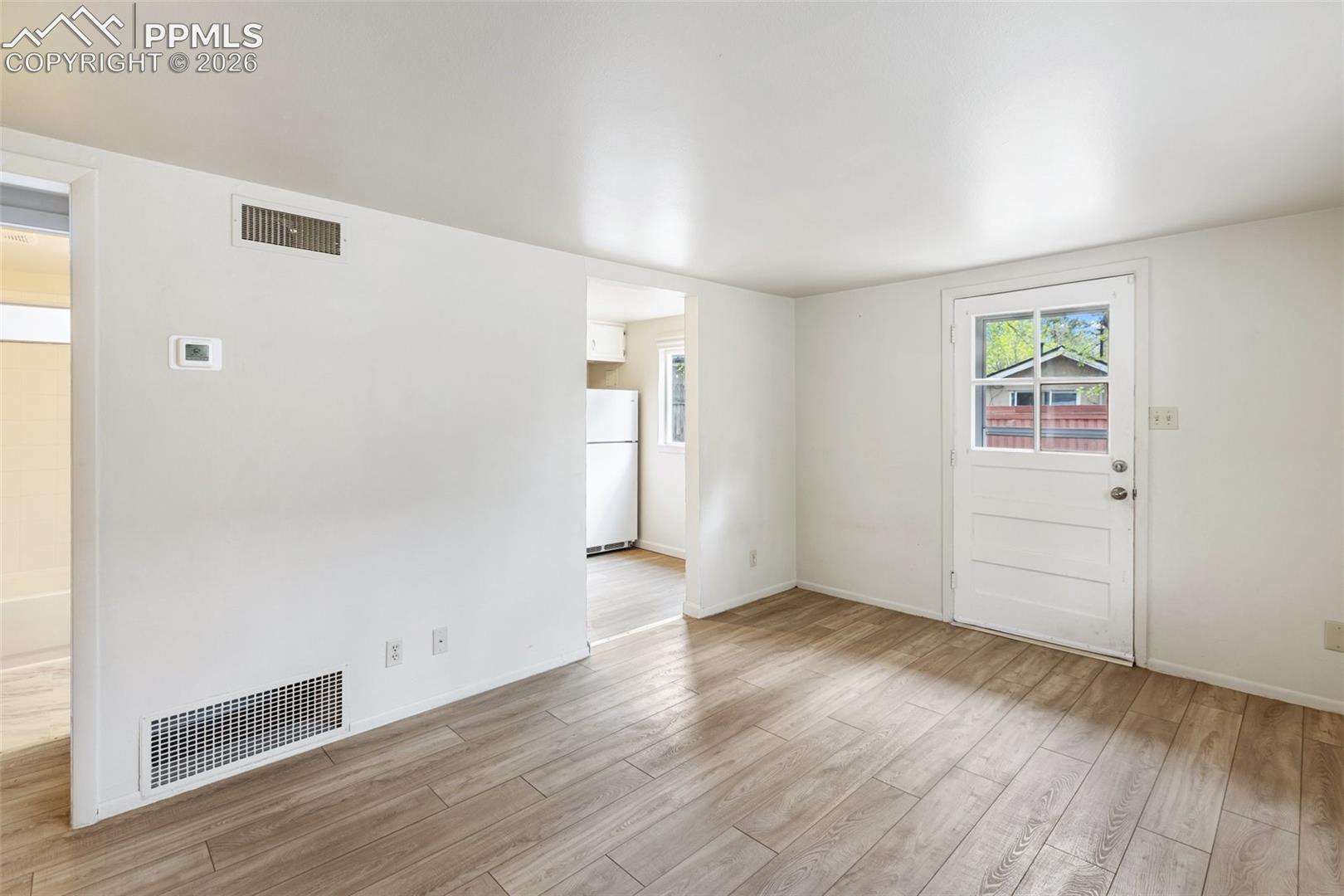 Living room features easy maintenance LVP flooring