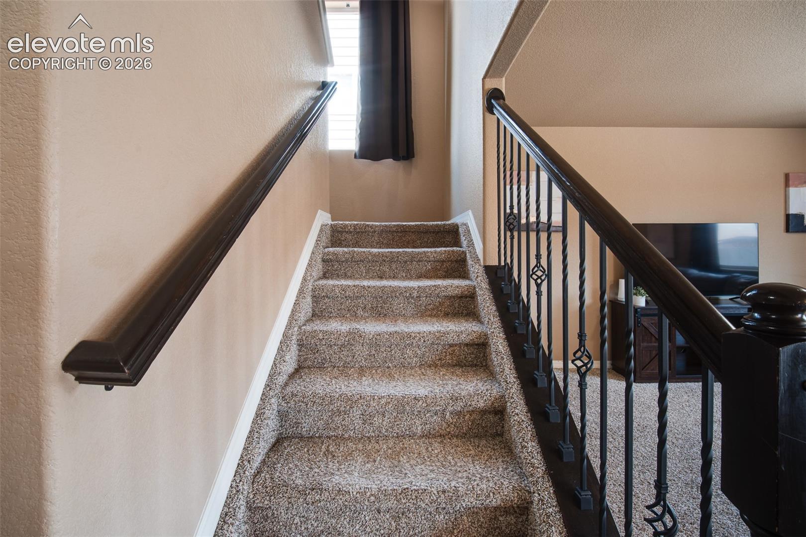 Stairs to the upper level.