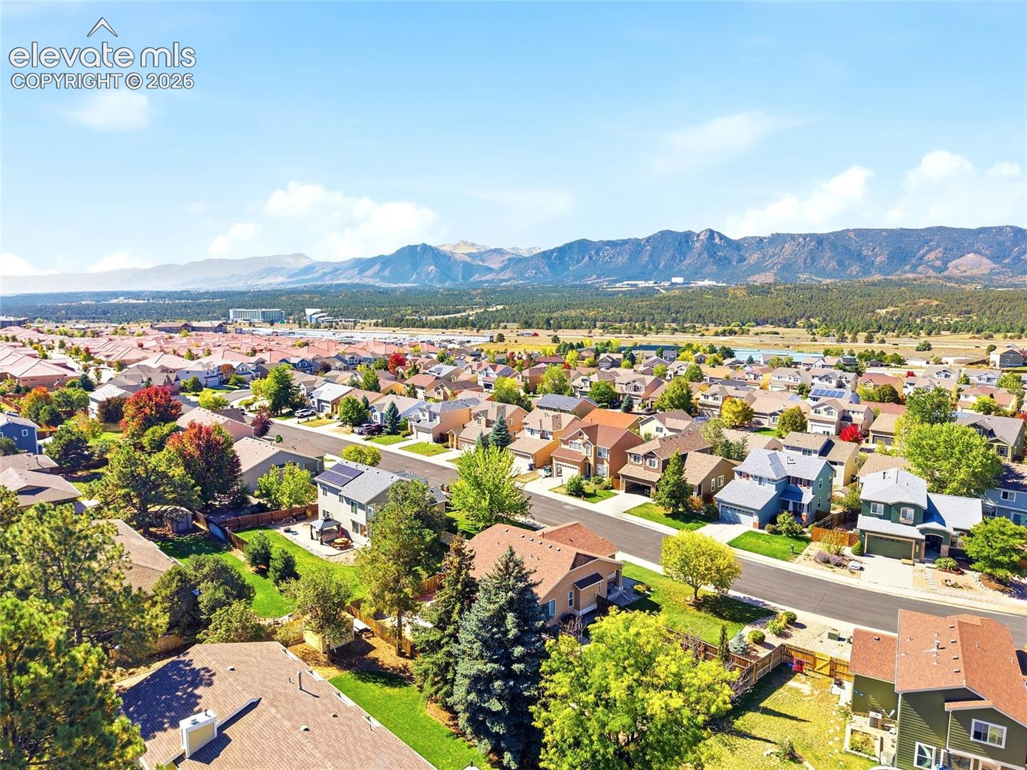 Community setting with surrounding mountain range backdrop