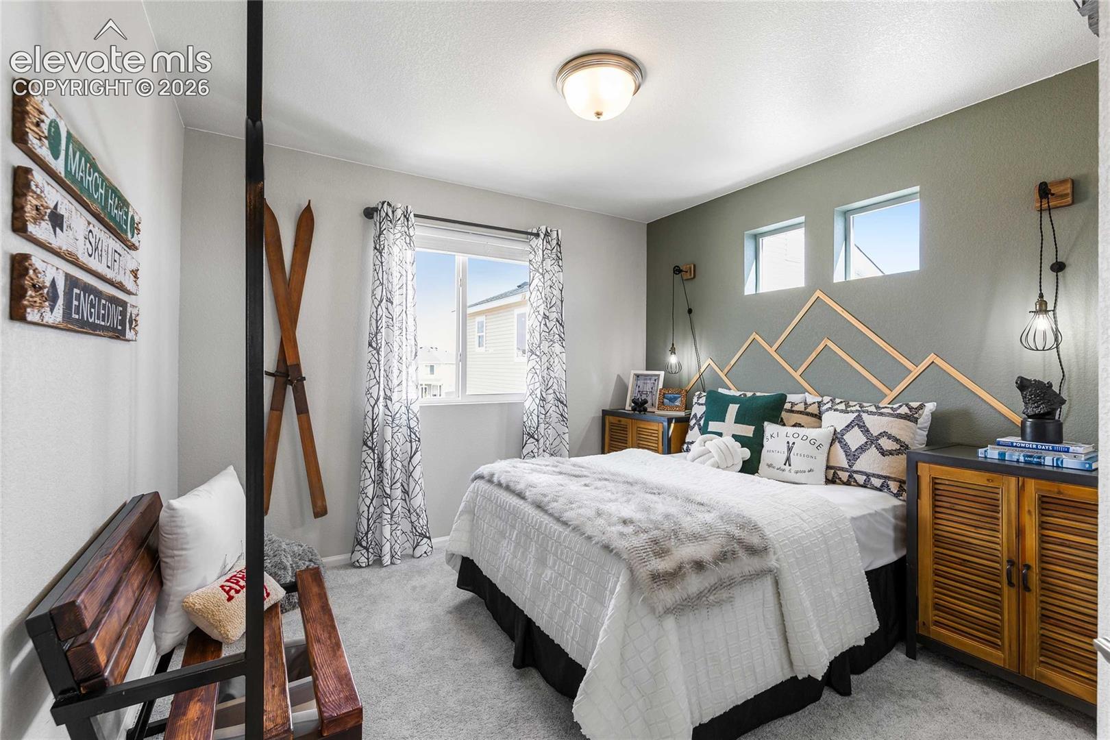 Wall-to-wall carpeting and a ceiling-mounted light fixture
*photos of a model home*