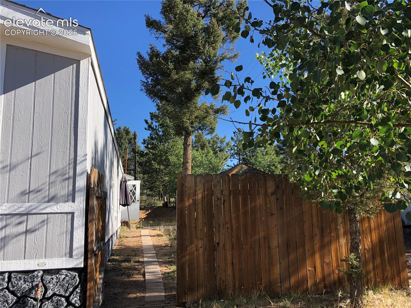 Partially Fenced Yard ~ Aspen and Pine Trees ~ Sunny Location