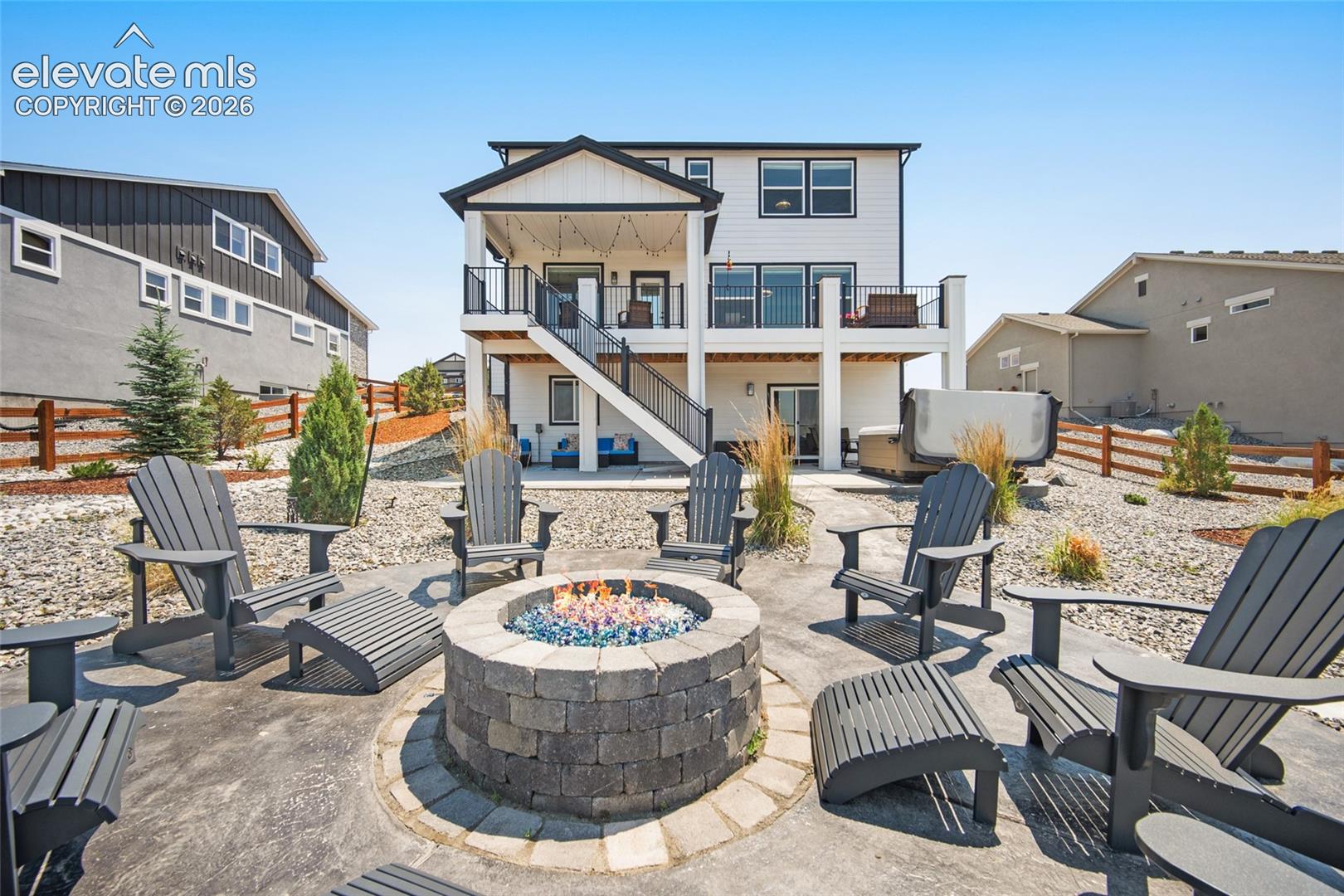 Custom paver patio with a built-in fire pit