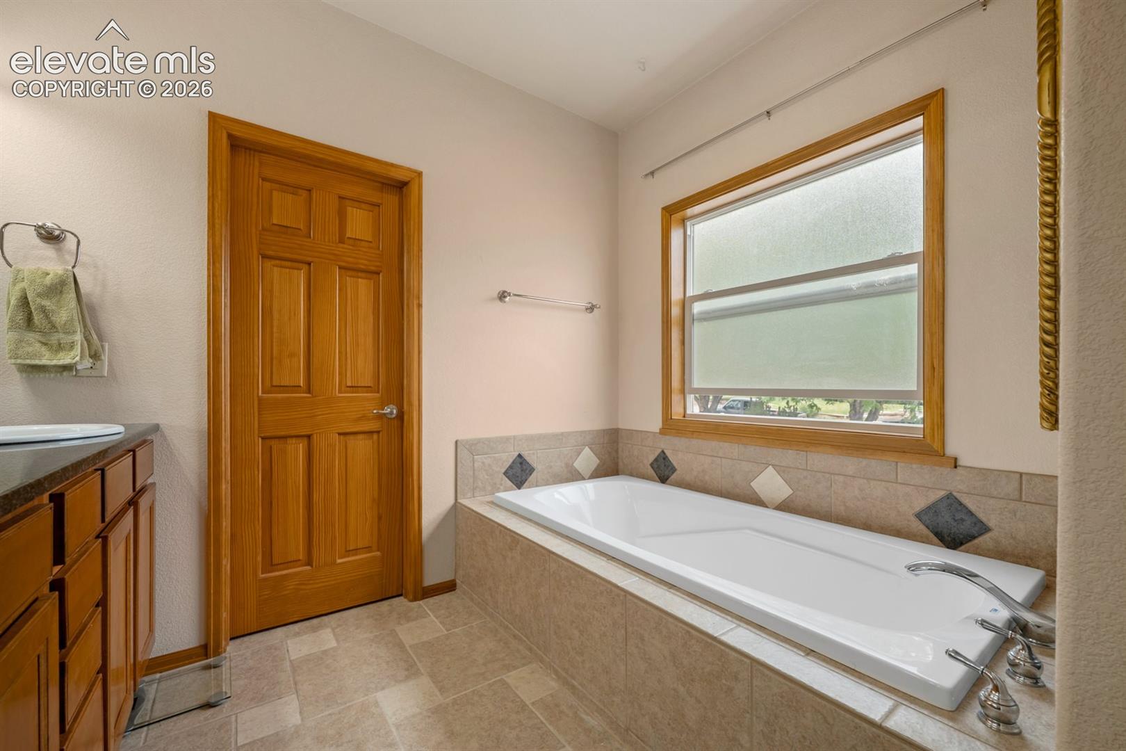 Deep soaking tub a unique touch of modern elegance.