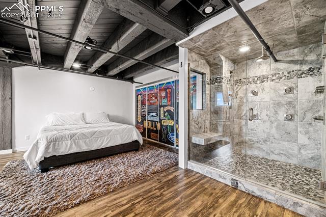 Bedroom featuring wood finished floors