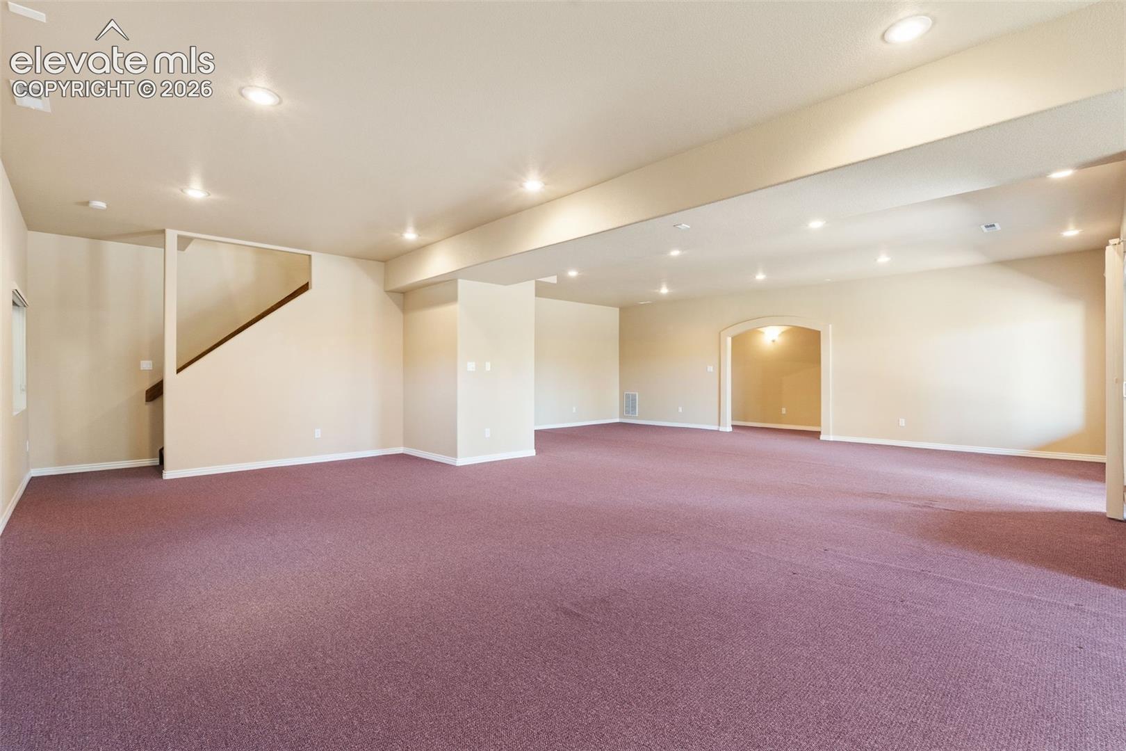 ADDITIONAL VIEW OF THE BASEMENT SHOWING STAIRCASE