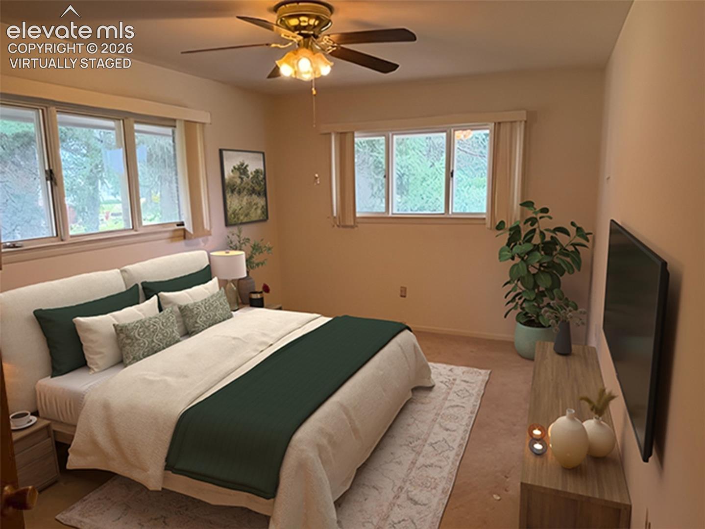Virtually staged bedroom #2 (main level)