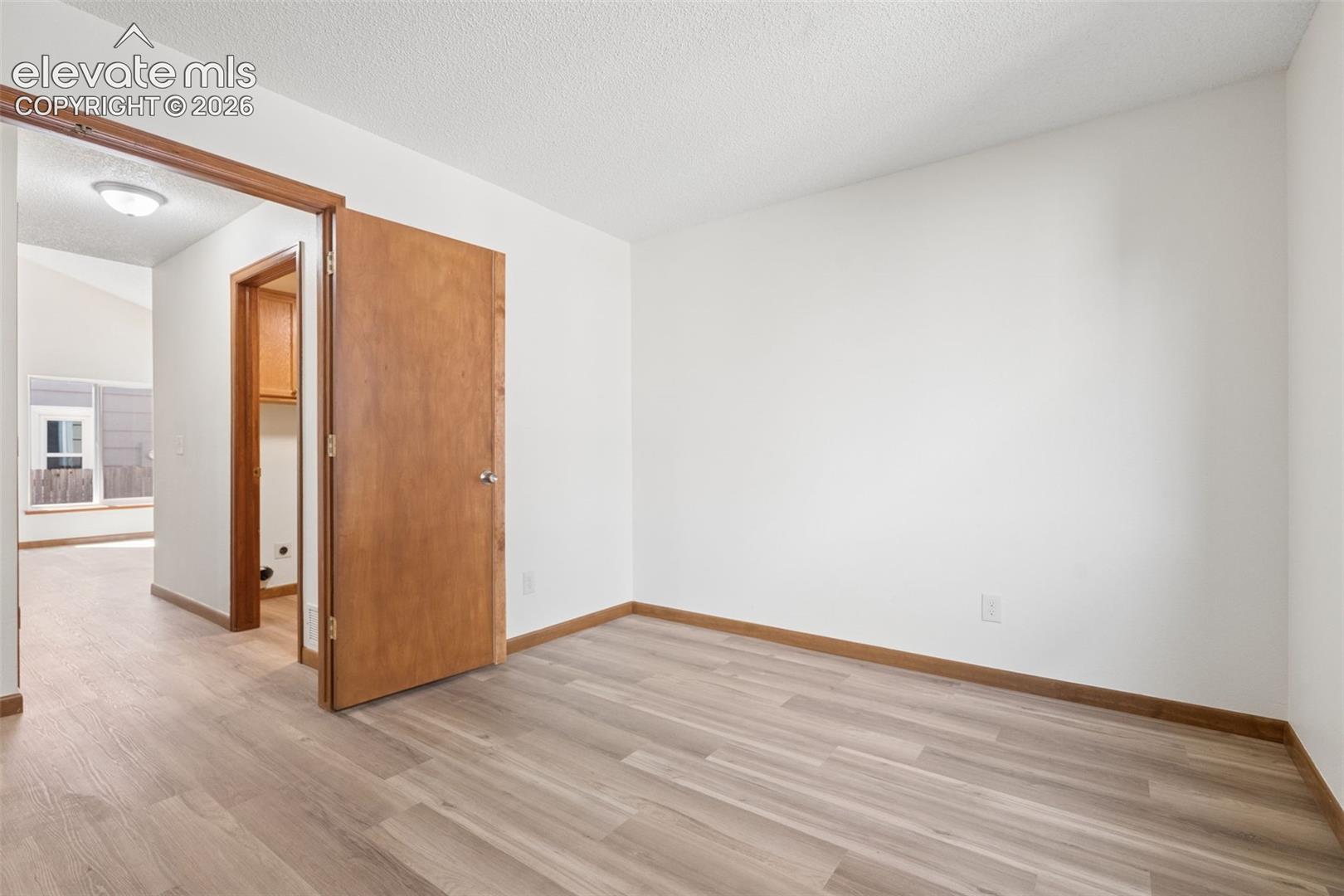 Large office that could be a 5th bedroom (no closet) with bathroom and walk-in shower next to it.