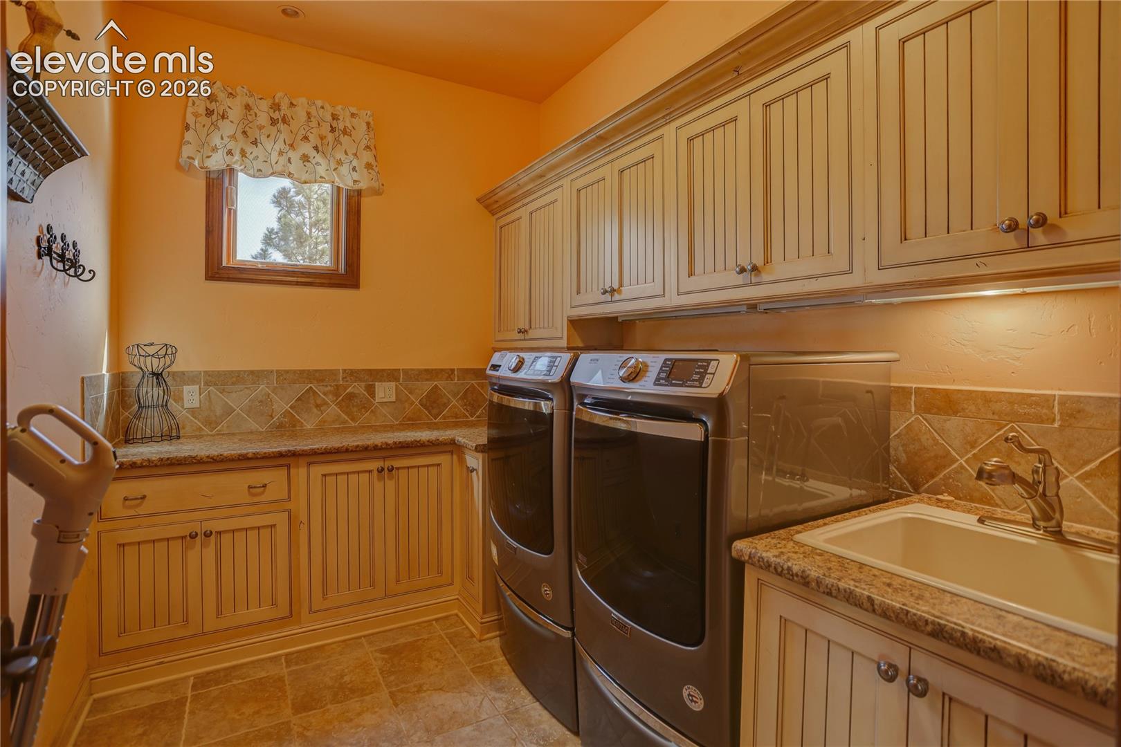 Main level laundry room.