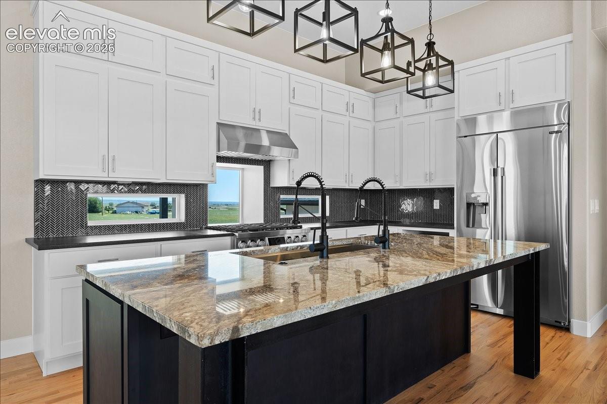 This is the same floor plan, built by the same builder, in the same neighborhood. Finishes will vary based on buyer's custom selections.