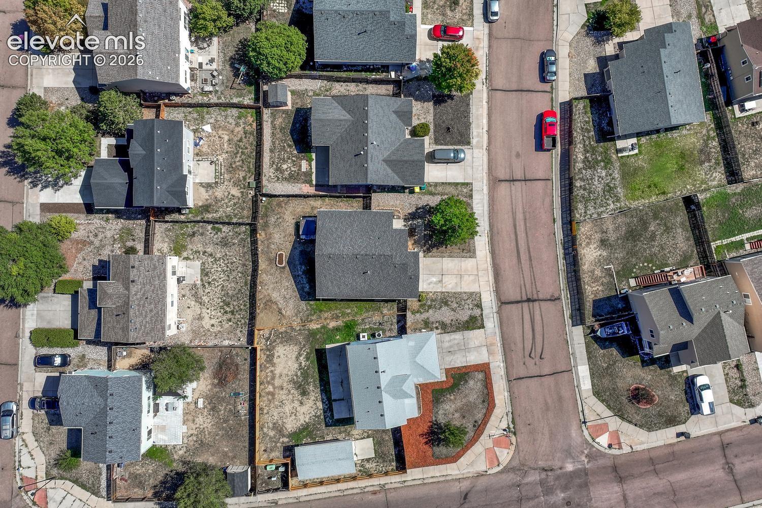 Aerial view of home and lot.