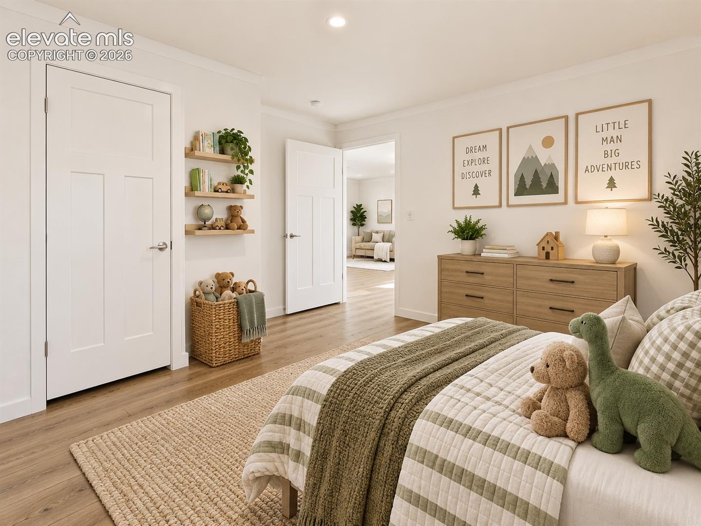 Bedroom – Spacious secondary bedroom offers wide-plank flooring, recessed lighting, a closet, and ample room for additional furniture and storage.