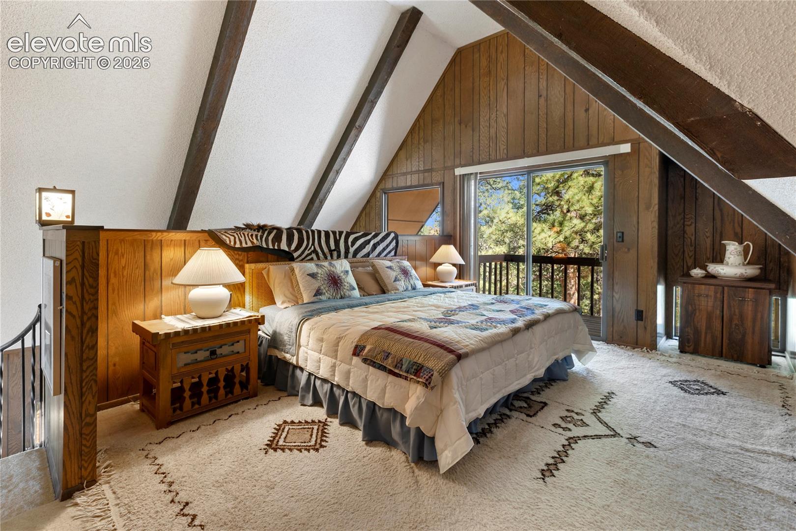 Upstairs you have a big bedroom with a walk out to a balcony