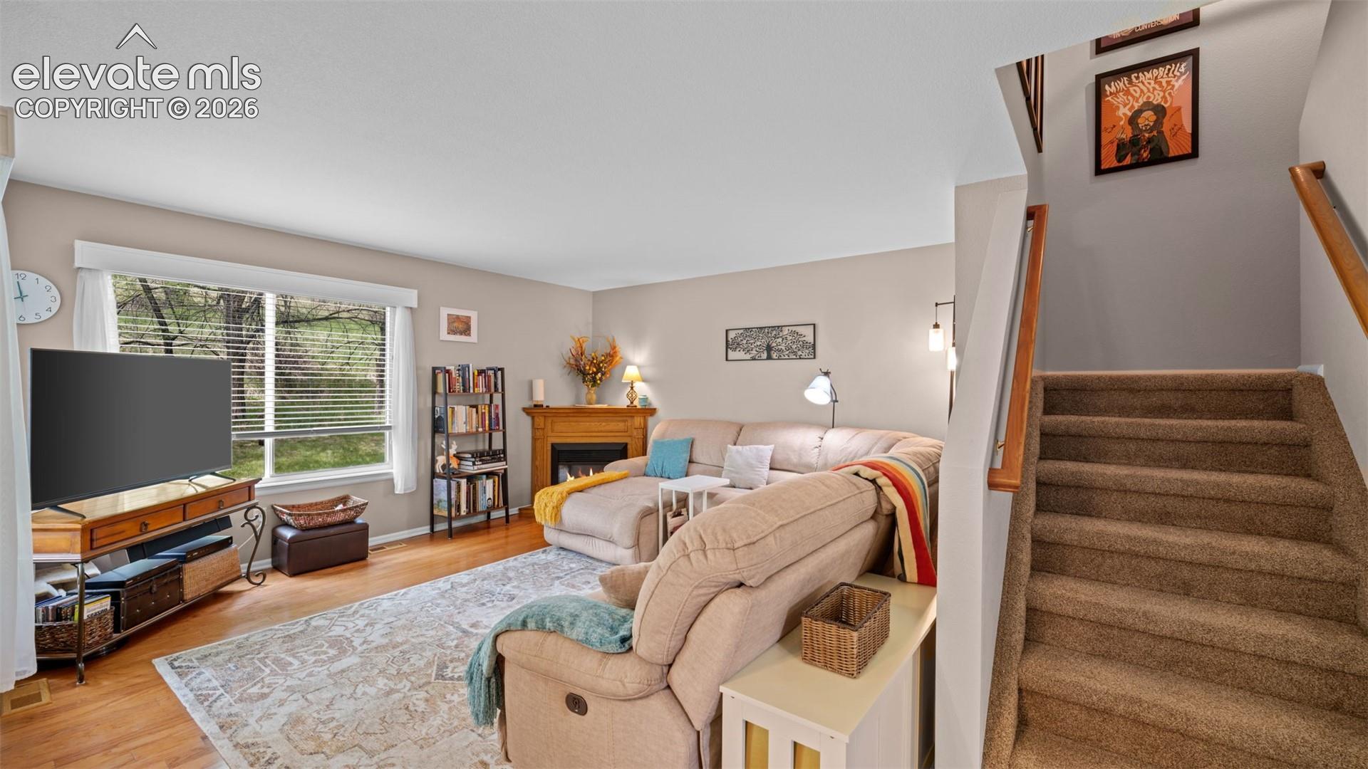 Living Room and Stair View ~ Near New Carpet with Wrapped Stairs and Double Wood Railings