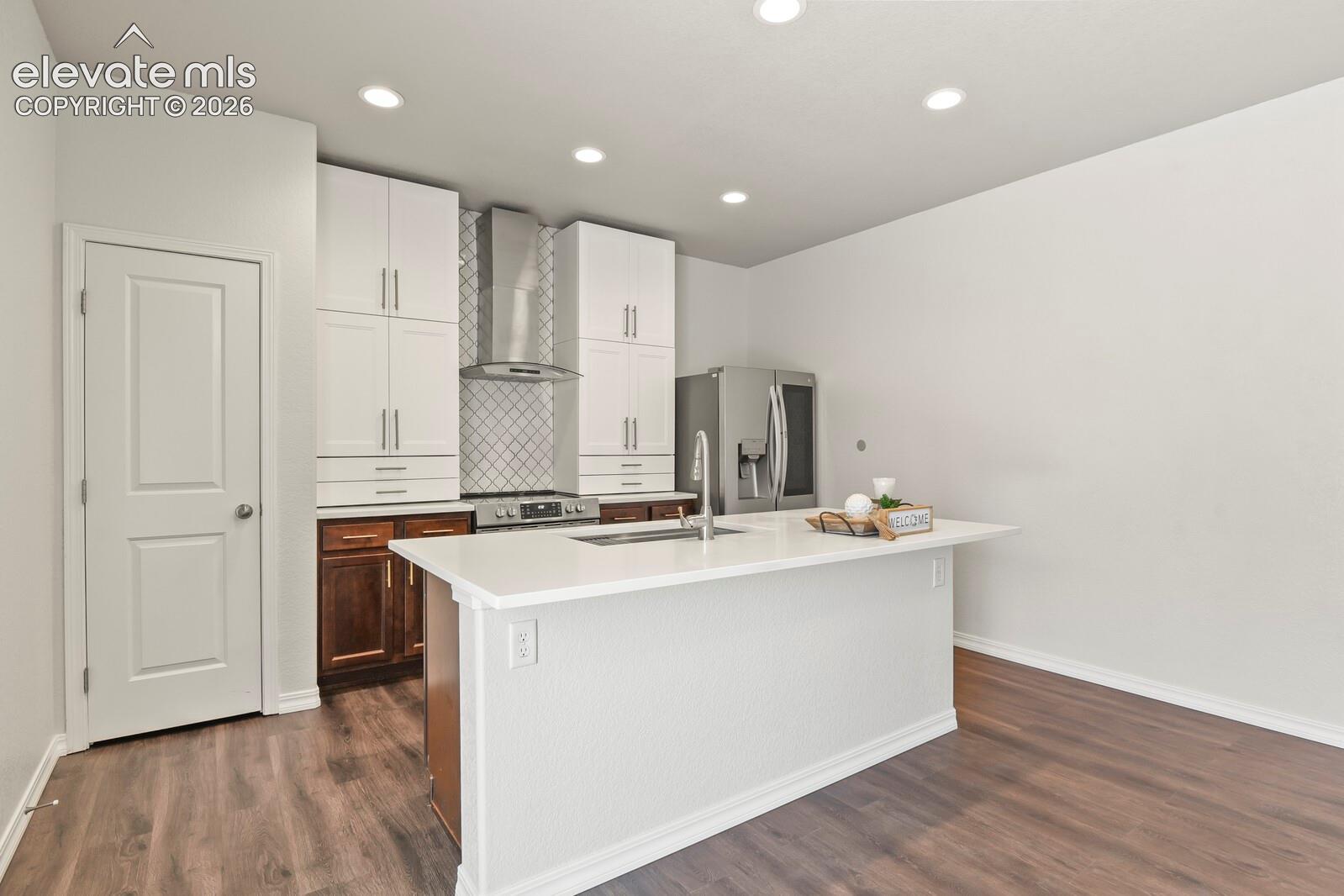 The upgraded kitchen tile is stunning