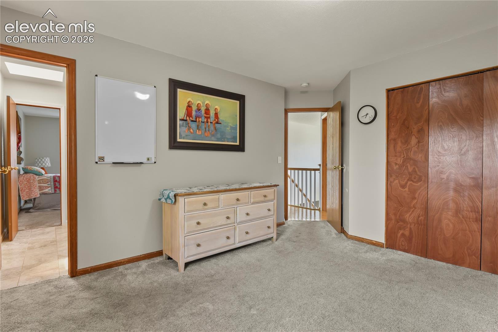 Upper level bedroom with bathroom access