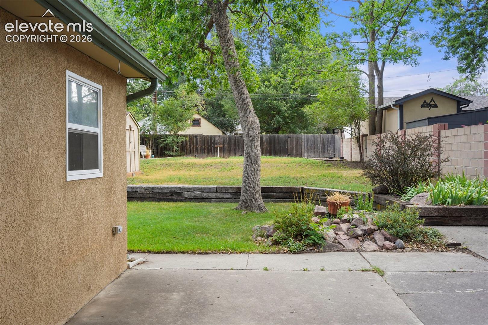 Great patio space leads to your lush yard! 
