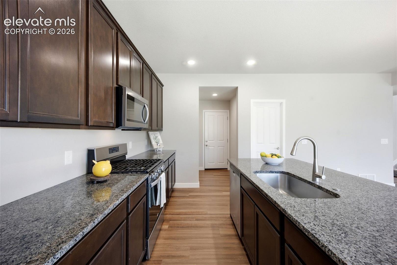 Granite Counters and Large walk in pantry