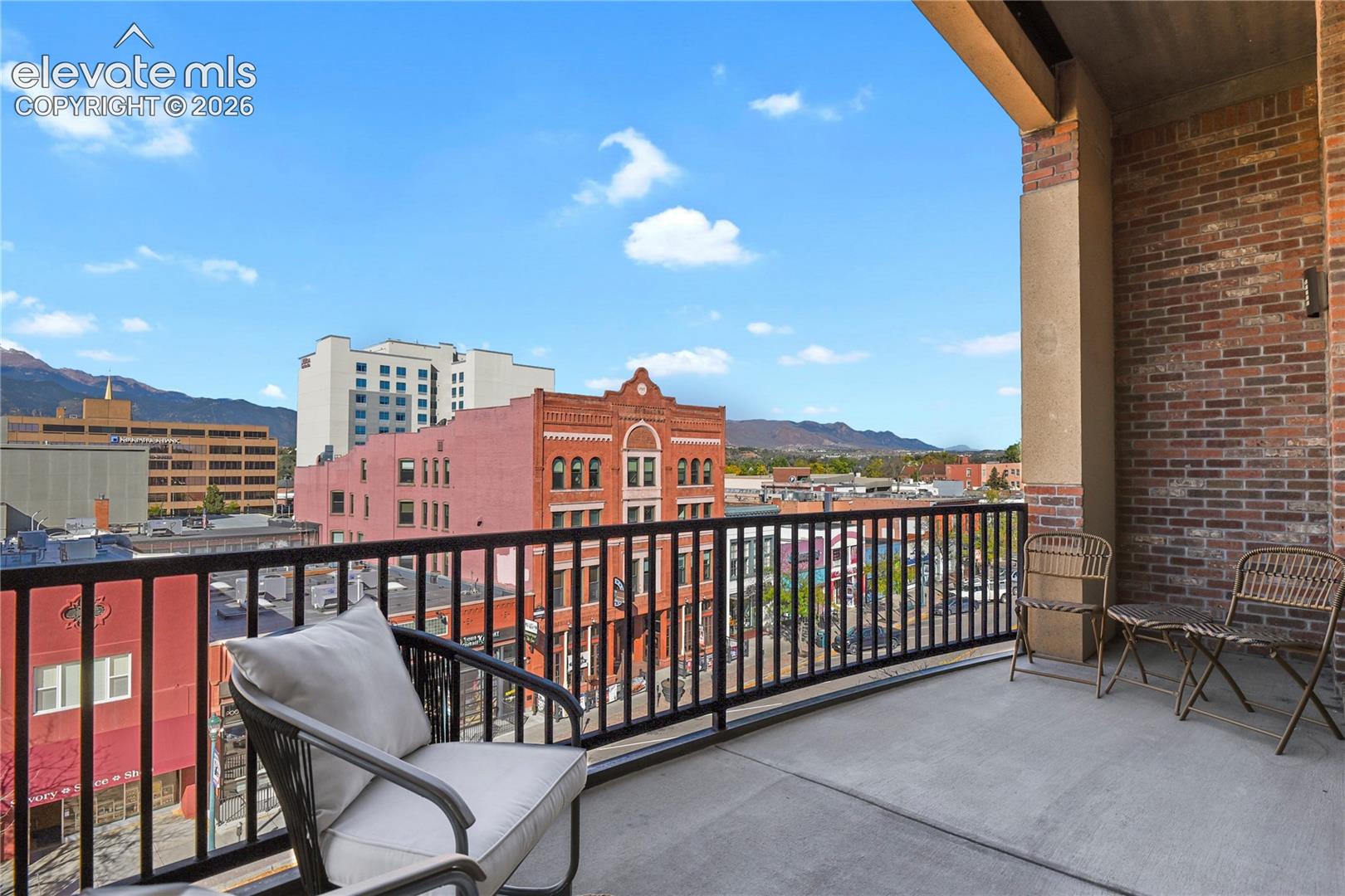 Huge covered patio overlooking Tejon Street perfect for parade watching!