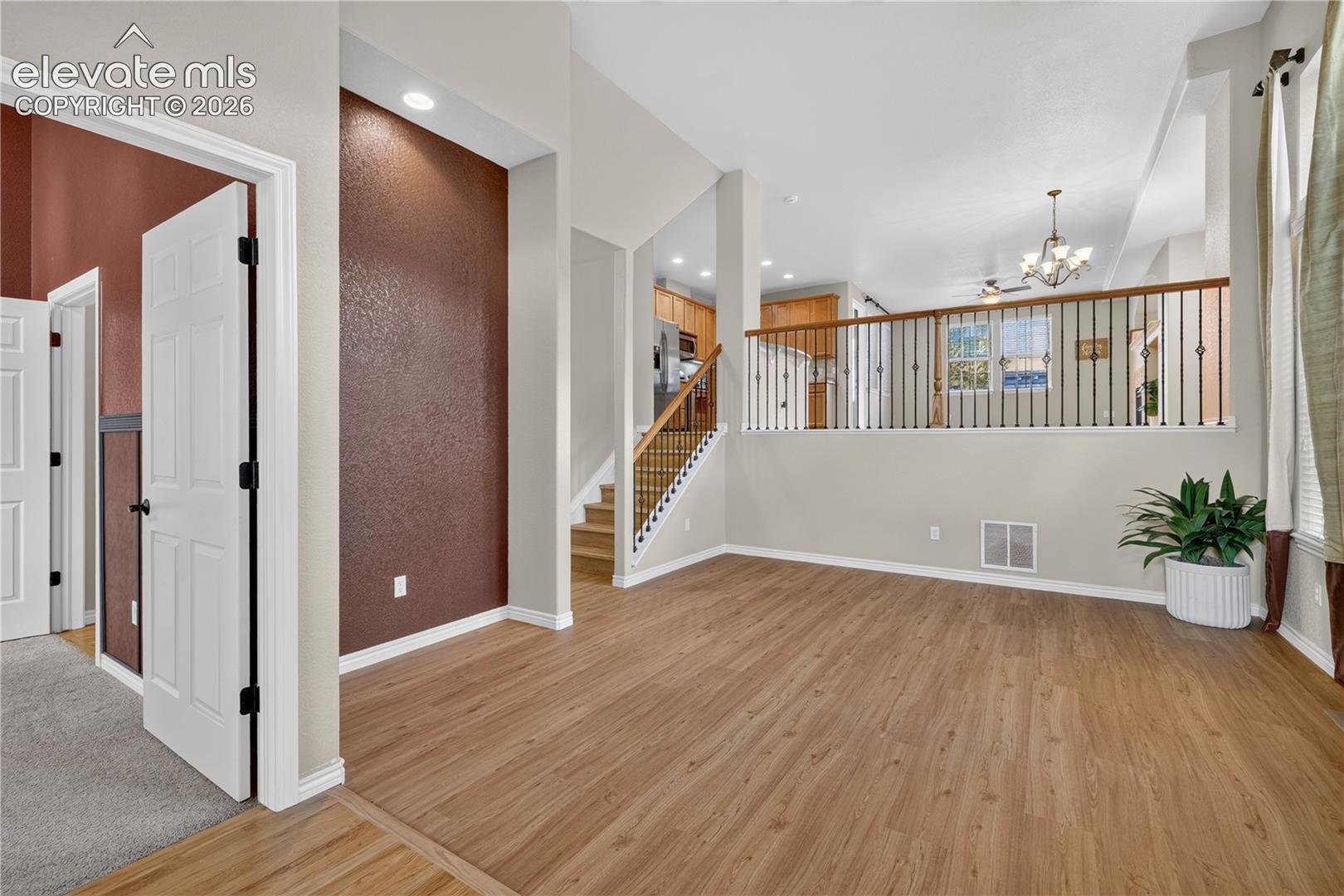 Office and half bath just to left foyer.