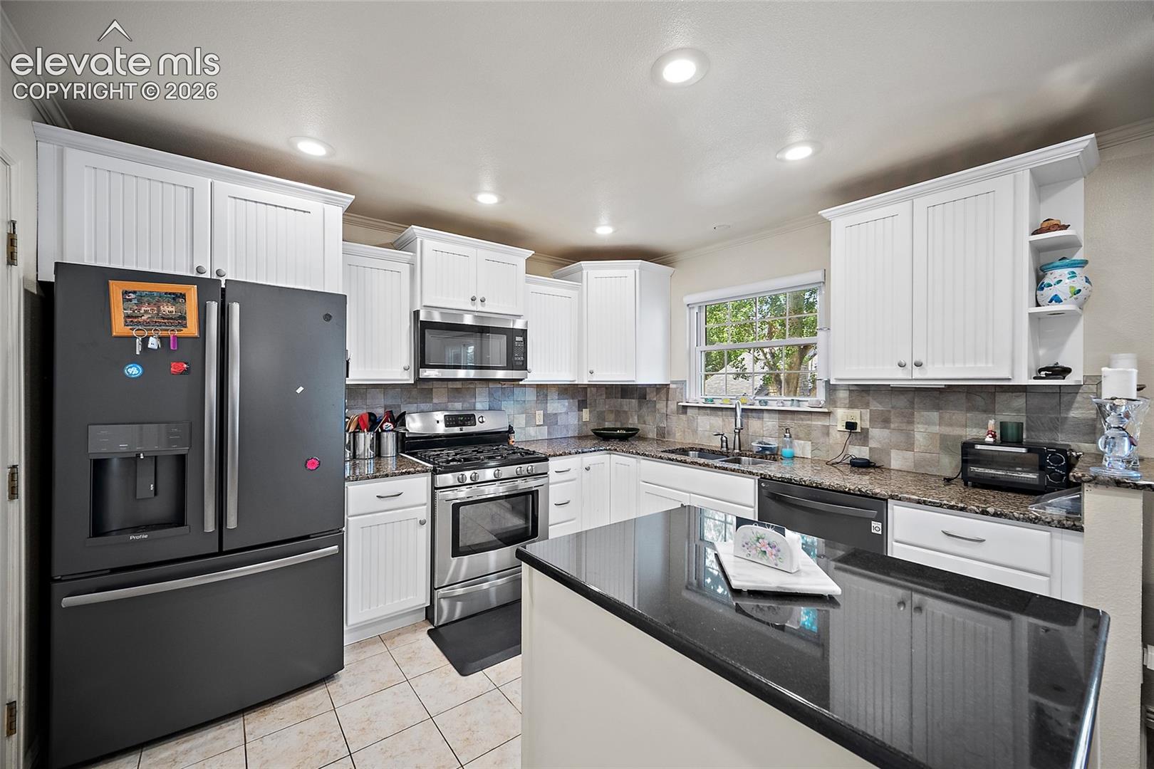 Tons of cabinets and granite countertops.    