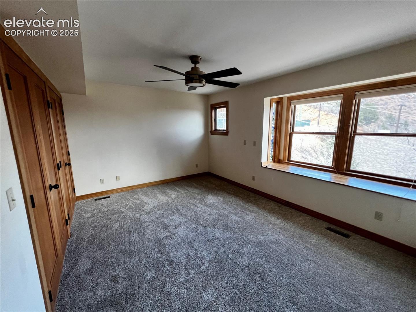 Custom Cottage: Main level bedroom with great views like every room in this home