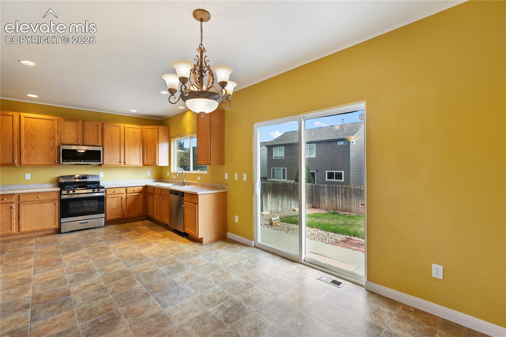 Kitchen flows into dining room and walks out.