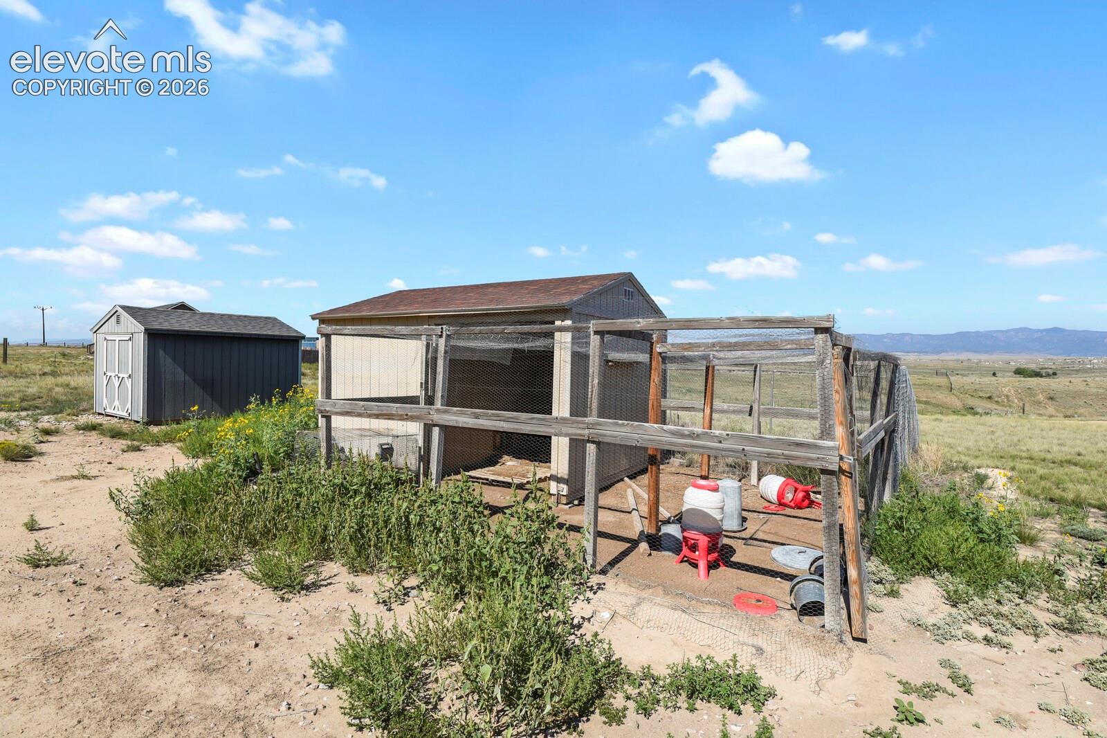 Chicken coop and loafing shed comes with the house. 