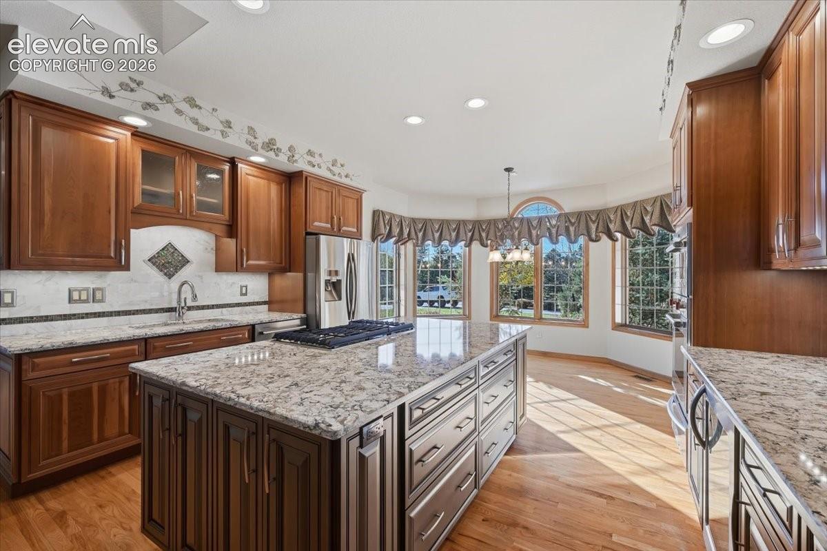 Gorgeous granite countertops compliment this amazing kitchen.  
