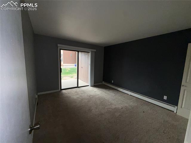 Primary bedroom with walk out to patio
