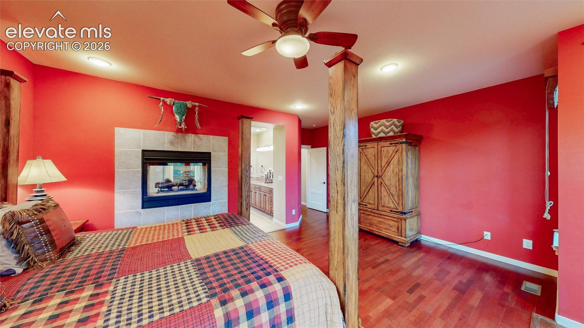 Main floor primary bedroom with attached ensuite.