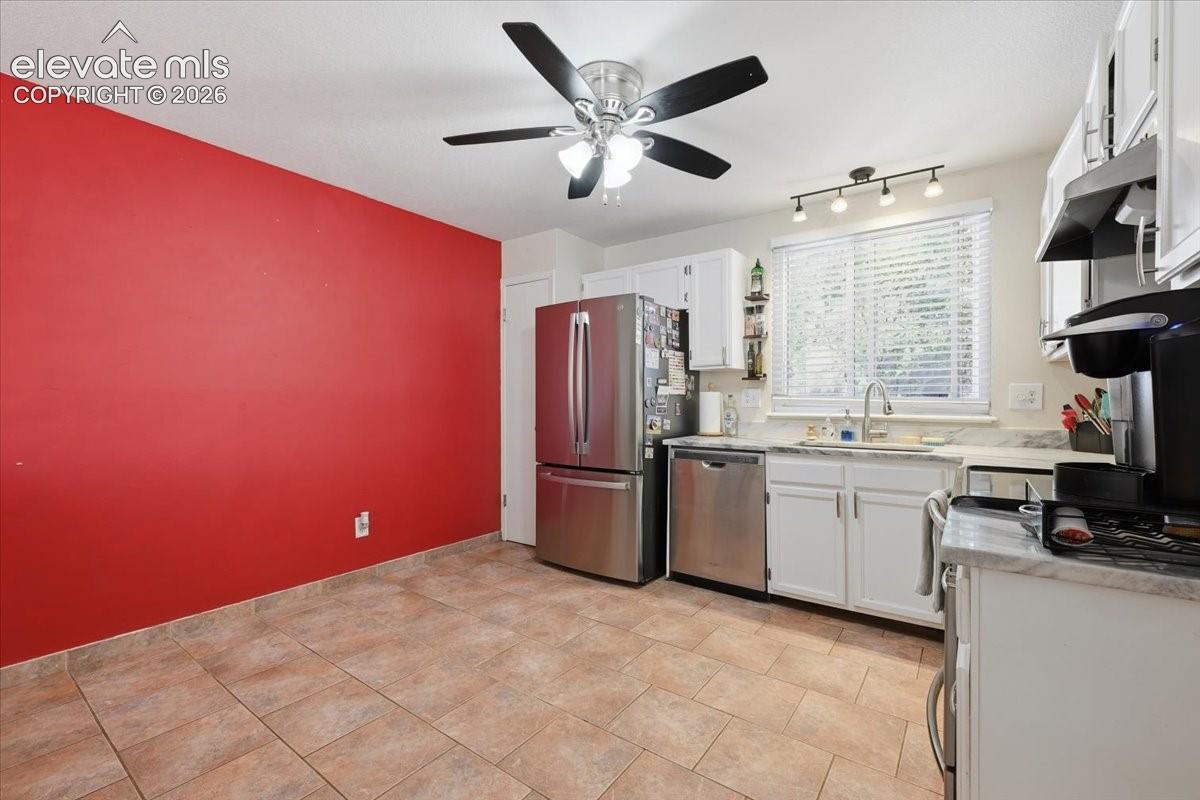 Updated kitchen offers room for a full table.