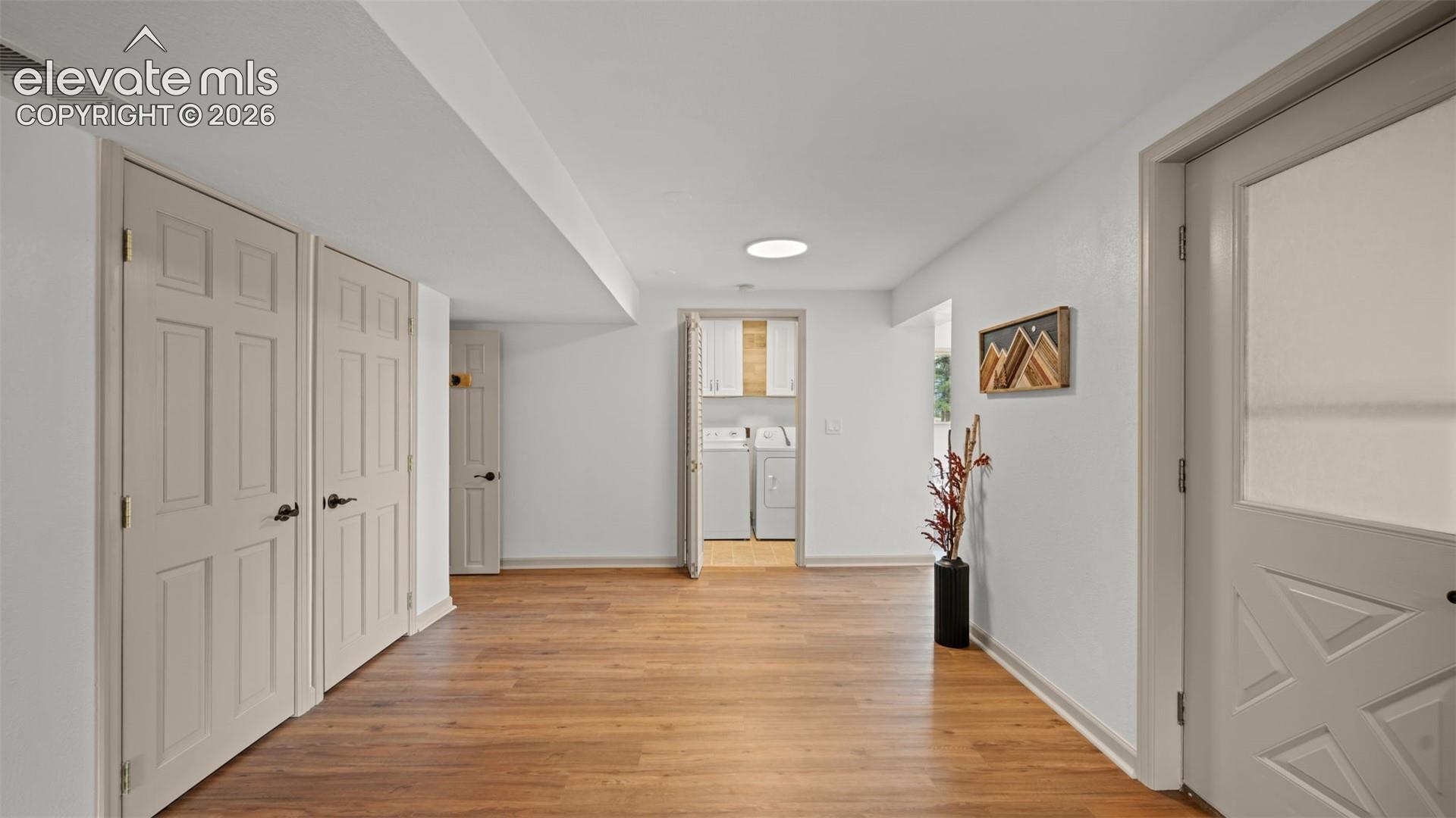 Attached bath with Laundry nearby with storage! 