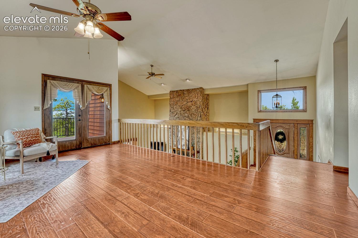 French doors lead to an outdoor deck where you can enjoy the Colorado sunshine.
