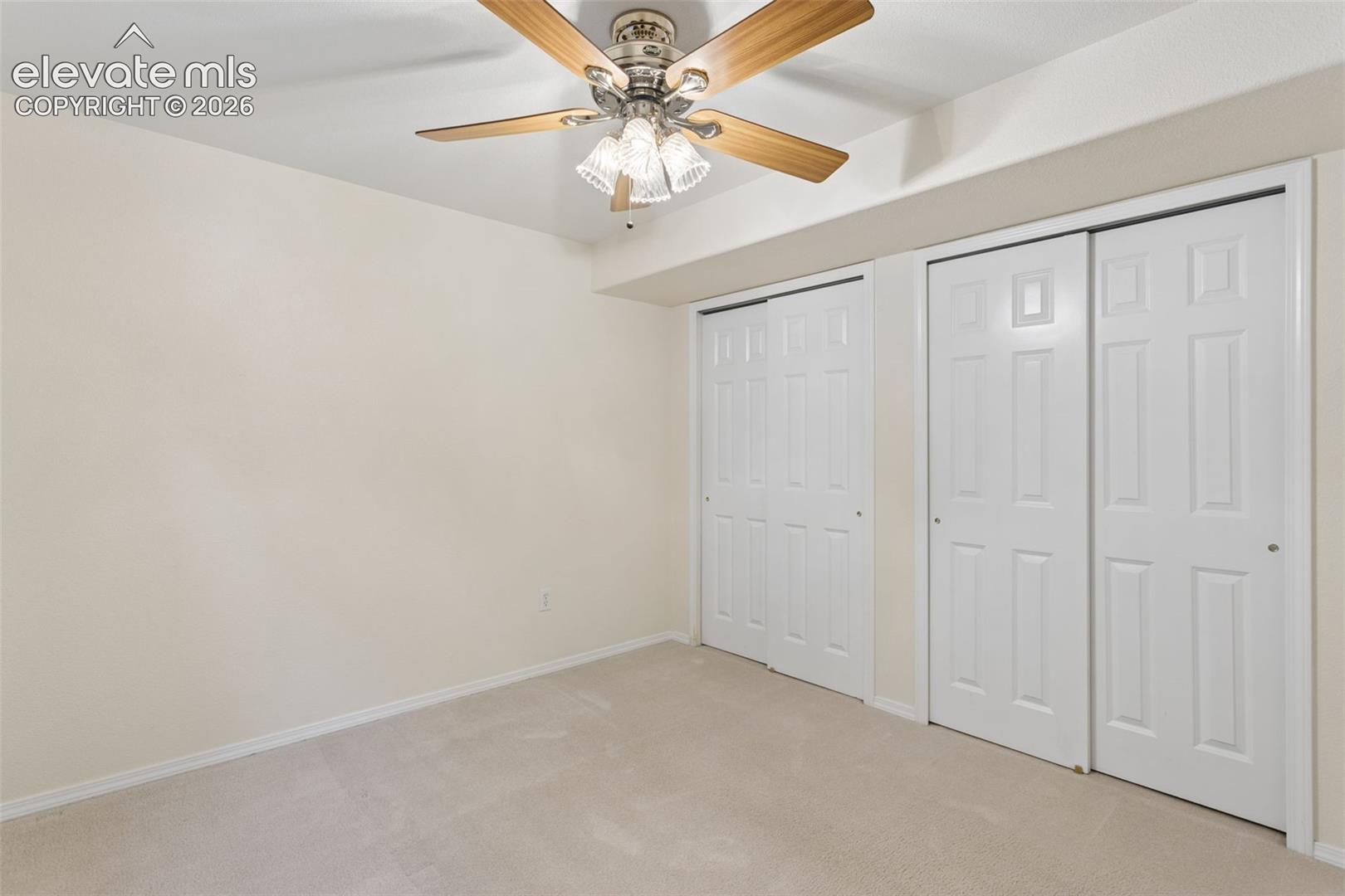 Basement bedroom with double closets.