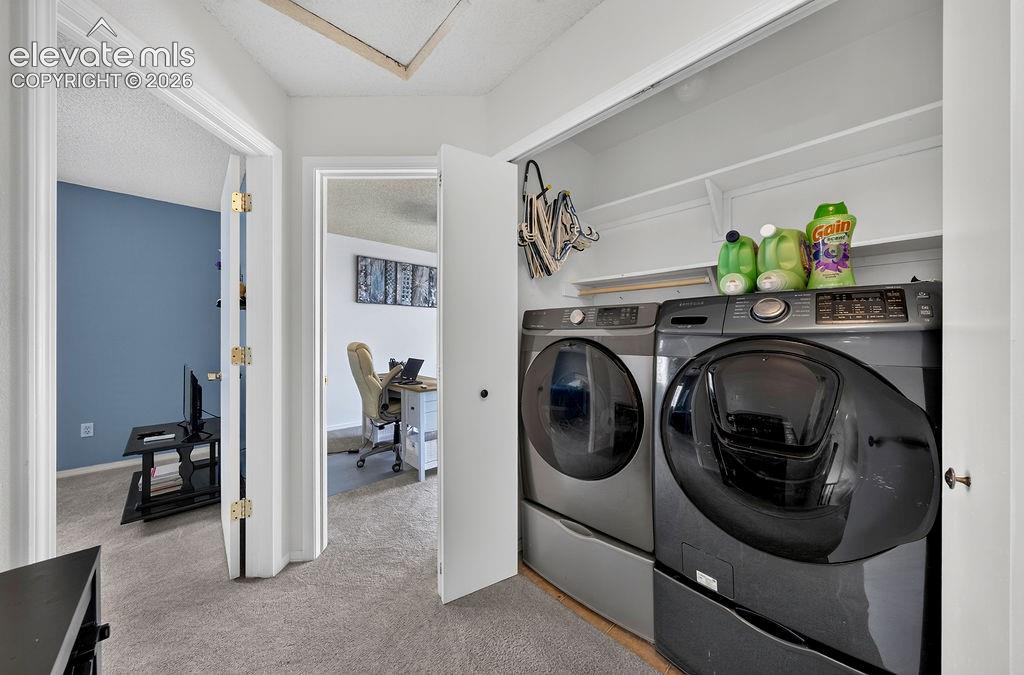 Dedicated laundry closet with shelving