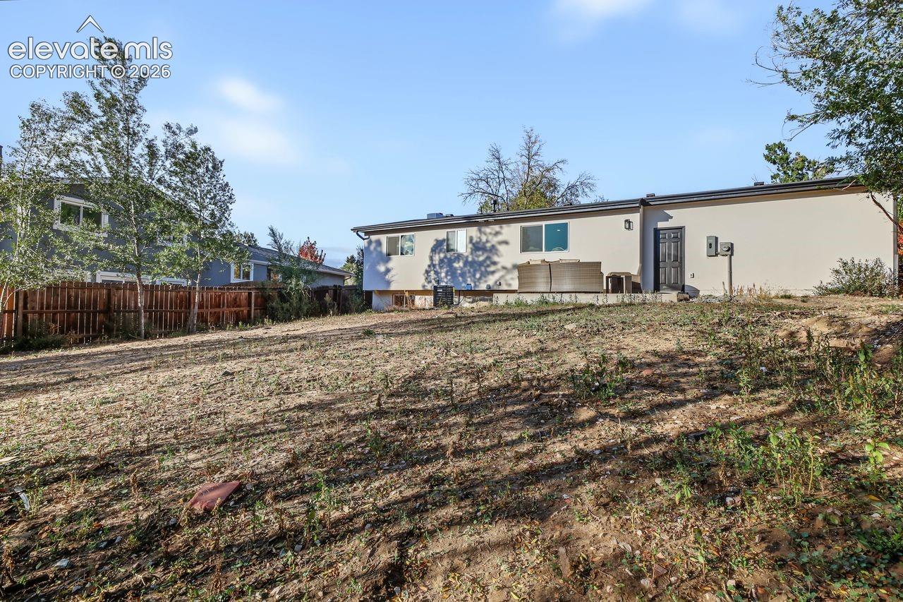 Spacious backyard fenced in! So many options!